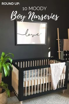 a baby's room with black walls and white crib