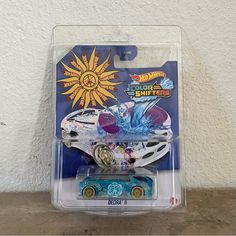 a toy car is in the packaging for hot wheels and it's not being used