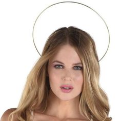 Top off your angel costume with this metal headband. It features a double metal arc design&one that sits on the head and a larger one that gives you a saintly halo. Adult Gold Floating Halo Metal Headband product details:  Metal One size fits most teens and adults Spot clean only Saint Halo, Saint Costume, Angel Halo, Wedding Tableware, Honeycomb Decorations, Wedding Balloon Decorations, Bird Costume, Toddler Parties, Arc Design