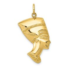 a gold pendant with an egyptian head on it