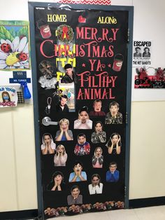 a door decorated with pictures and words for the holiday season, in front of a bulletin board