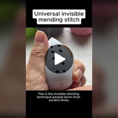 a person holding an object in their hand with the words universal invisible mending stitch on it