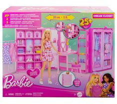 a barbie doll plays with her bedroom and closet set in the box for playtime