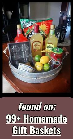 the gift basket is filled with alcohol, lemons, and other condiments