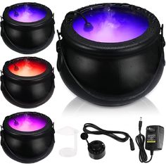 three black speakers with purple and red lights