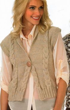 a woman wearing a sweater vest with buttons on the front and back, smiling at the camera