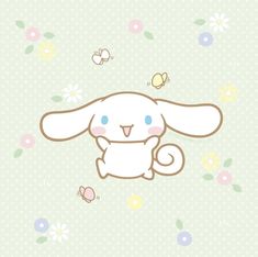 a cute little bunny sitting in the middle of flowers and butterflies on a green background