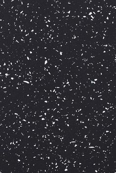 black and white speckled background with small dots