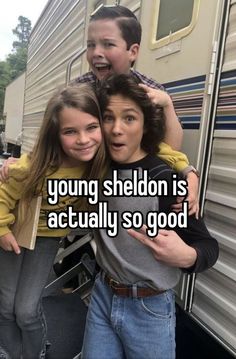 two young children standing next to each other in front of a trailer with the caption, young shedon is actually so good