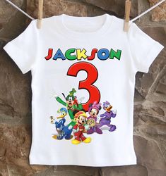 An fun, playful Mickey and the Roadster Racers birthday shirt personalized with your child's name and age. All shirts are 100% cotton. I use a professional heat press to transfer the image, NOT a home iron. I will personalize it with your child's name and age for no addition cost. I use high quality shirts from ARB Blanks. These are very soft shirts, not thin undershirts. Please see the size chart below for the t-shirts and choose your options in the drop down menus. *Please note heat pressed shirts may become distressed through wash/wear. Always wash them inside out on a delicate cycle using mild detergent and no bleach. Roadster Racers Birthday, Mickey And The Roadster Racers, Heat Press Shirts, Birthday Shirt, Kid Names, Birthday Shirts, Heat Press, Inside Out, Gender Neutral