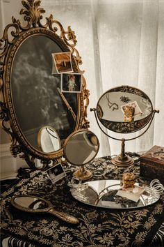 there is a mirror and other items on the table