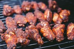 chicken is being cooked on the grill