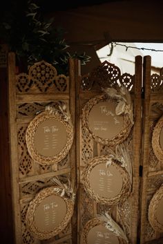 a wooden table with plates and menus on it