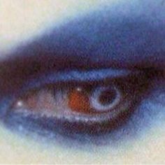 an eye is shown with blue and orange colors