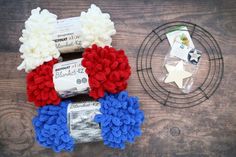 some red, white and blue items on a wooden table