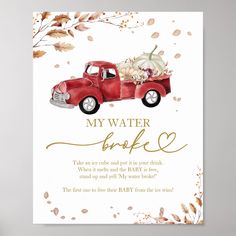 a red truck with pumpkins and leaves on it