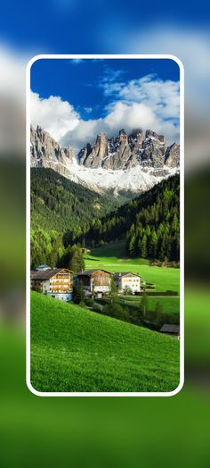 a green field with mountains in the background and a white square frame over it that says,