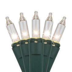 green christmas lights with clear bulbs on white background