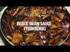 black bean sauce in a skillet with the words teokbookki on it