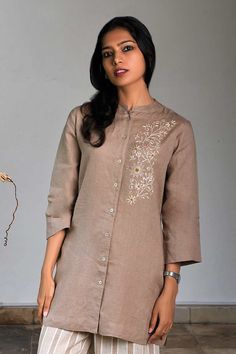 Elegant Linen Kurta For Spring, Spring Linen Tunic Kurta, Embroidered Beige Linen Top, Beige Embroidered Linen Top, Beige Linen Tops With Floral Embroidery, Long Sleeve Linen Top With Floral Embroidery, Fitted Linen Dress With Floral Embroidery, Spring Linen Kurta With Floral Embroidery, Spring Long Sleeve Kurta With Tonal Embroidery