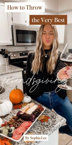 a woman sitting at a kitchen counter with a glass of wine in front of her and the words how to throw the very best thanksgiving party