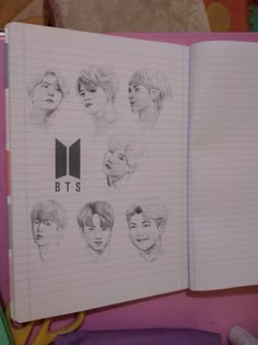 an open notebook with drawings of bts on it