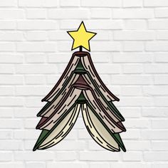 a white brick wall with a christmas tree made out of books and a star on top