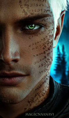 the poster for the movie maleficent with white hair, green eyes and tattoos on his face