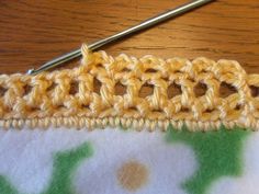 the crochet stitch is being worked on