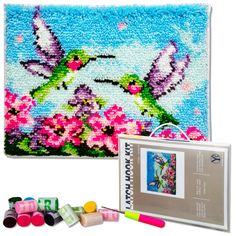 the kit includes an image of a hummingbird and flowers with crayons on it