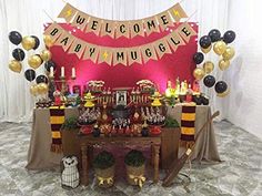 a harry potter birthday party with balloons and decorations