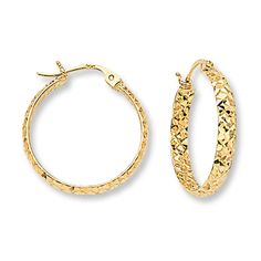 These stylish hoop earrings for her are textured with an exciting diamond-cut pattern. The earrings are fashioned in 14K yellow gold and secure with hinged backs. Textured 14k Yellow Gold Jewelry, Textured Yellow Gold Round Hoop Earrings, Textured Yellow Gold Hoop Earrings, Textured Round Jewelry For Anniversary, Textured Yellow Gold Round Jewelry, Jewelry Education, Jewelry Advice, Jared The Galleria Of Jewelry, Accessories Jewelry Earrings