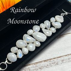 Stunningly Beautiful Artisan Handcrafted Rainbow Moonstone Bracelet 925 Stamped Silver Setting! Wow! A Unique & One Of A Kind "Work Of Art!" The Stones In This Piece & The Design Are Absolutely Stunning! Gift Boxed & Ready For Gift Giving! Moonstone Is Good For Activating Your Creative And Intuitive Power Of Feminine Energy Which Helps You Get In Tune With Your True Emotions. Adjustable 6.5 - 8 Inches Be Sure To Follow My Store And Check Out My Other Listings! Other Listings Hand Crafted Gift Na White Gemstone Bracelet In Sterling Silver, Handmade Moonstone Sterling Silver Bracelet Gift, White Sterling Silver Gemstone Bracelet, Handmade Sterling Silver Moonstone Bracelet Gift, White Sterling Silver Bracelet With Gemstone, White Sterling Silver Bracelets, Unique White Sterling Silver Bracelets, Handmade Sterling Silver Bracelet In White, White Sterling Silver Bracelet