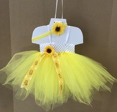 READY TO SHIP. Bright Yellow . YOU HAVE THE OPTION TO BUY THESE PIECES TOGETHER OR SEPARATELY. 4 PIECES : Sunflower Headband, tulle tutu-dress, Diaper cover and matching Barefoot baby sandals. AS PICTURED IN PHOTOS Yellow Tutu Dress For Birthday In Summer, Fitted Tutu Dress For First Birthday In Summer, Summer Party Tutu Dress With Flower Shape, Summer Party Flower Shape Tutu Dress, Summer Party Flower Shaped Tutu Dress, Summer Party Flower-shaped Tutu Dress, Summer Flower-shaped Tulle Tutu Dress, Cute Yellow Tutu Dress For Spring, Sunflower Tutu