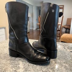 Chanel Black Leather Side Zip Cc Logo Biker Moto Boots Sz 39 Us 8.5 Serial #G27805 100% Authentic Impeccable Condition, Gently Worn With No Significant Signs Of Use. Heels Were Just Redone. Soft Black Leather Mid Calf Moto Boots Adjustable Buckles Signature Silvertone Hardware Cc Logo At Top Of Shaft 1-1/2"Heel Black Moto Boots For Motorcycling, Black High-top Calf Leather Moto Boots, Black Moto Boots For Streetwear, Classic Black Moto Boots For Biker Events, Luxury Black Calf Leather Moto Boots, Casual Black Calf Leather Moto Boots, Designer Black Moto Boots With Round Toe, Oxford Shoes Outfit Women's, Mid Calf Boots Outfit