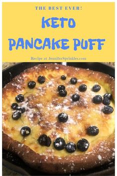 the best ever keto pancake puff recipe with blueberries and powdered sugar