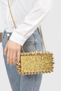 Sparkle and shine at any special event with our Metallic Beads Glitter Iconic Box Clutch! This beautiful clutch not only adds a touch of glamour to any outfit, but also has the versatility to be carried as a crossbody. Get ready to turn heads and make a statement! Length - 9" Width - 2.5" Height - 5"Acrylic, Mix MetalIncludes Shoulder Chain Snap On Closure Lead & Nickel Compliant Acrylic Clutch, Box Clutch, Glitter Acrylics, Womens Cocktail Dresses, Shoulder Chain, Beaded Trim, Dress For Short Women, Sneaker Heels, Matching Dresses