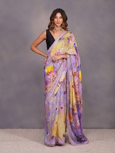 Lavender Big Flower Print Saree With Unstiched Blouse (Set of 2) By Devyani Malhotra now available at Trendroots Designer Tussar Silk Pre-draped Saree With Printed Border, Festival Georgette Saree With Printed Motifs, Festive Georgette Saree With Printed Motifs, Bollywood Style Pre-draped Saree With Printed Border For Diwali, Festive Chanderi Pre-draped Saree With Printed Border, Bollywood Style Georgette Saree With Printed Motifs, Pre-draped Katan Silk Saree With Printed Border, Diwali Georgette Saree With Printed Motifs, Georgette Saree With Printed Motifs In Traditional Drape