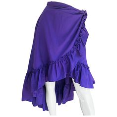 Incredible vintage 1980s EMMANUELLE KHANH purple cotton flamenco style wrap skirt! Features a ruffled hem that is shorter in the front and longer in the back. POCKET at right waist. Hidden button closure and ties at the left waist. Can easily be dressed up or down. Great with a tucked in crisp blouse, or perfect paired with a crop top. In great condition. Made in France Marked Size EU 38 (interior button can be moved quite a bit for larger size) Measurements: 26-27 inch waist Up to 40 inch hips Purple Wrap, Purple Vintage, Vintage Rock, Mermaid Skirt, Hem Skirt, Vintage Cotton, Wrap Skirt, Tom Ford, Vintage Clothing