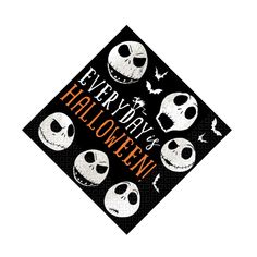 a black and orange halloween napkin with jack skellingy faces on it