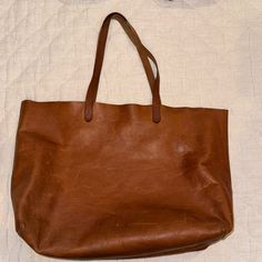 Questions? Leave A Comment Below! Classic Tan Shoulder Bag For Everyday Use, Classic Tan Satchel For Everyday, Vintage Cognac Everyday Bag, Vintage Soft Leather Everyday Bag, Classic Hobo Bag With Leather Handles For Errands, Classic Cognac Shoulder Bag For Errands, Large Capacity Tan Leather Satchel, Classic Pouch Satchel For Errands, Everyday Tan Pouch Shoulder Bag