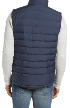 The layering possibilities are endless with this versatile down vest that offers tons of warmth and powerful protection against the elements. 26 1/2" length (size Medium) Lined, with down fill 100% polyester Machine wash, tumble dry Imported Down Vest, Night Sky, Layering, Winter Jackets, Water Resistant, Nordstrom, Size Medium, Water