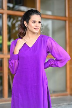 PRODUCT DESCRIPTION:-Let your personal style speak about your personality ,As you look absolutely gorgeous in our Purple Chiffone Co-Ord set.Kurta Fabric :- ChiffonPant Fabric :- ChiffonColor:-PurpleCare Instructions :- Dry clean onlyModel Size :- Model is wearing XS sizeModel Height :- 5.5''DISCLAIMER :- Slight color variations may occur due to different screen resolution. Chic Chiffon Long Sleeve Sets, Chic Long Sleeve Chiffon Set, Trendy Formal Sets With Long Sleeves, Elegant Purple Georgette Blouse, Elegant Purple V-neck Sets, Elegant Purple Chiffon Blouse, Long Sleeve Georgette Tops For Party, Long Sleeve Georgette Party Tops, Chiffon Pants