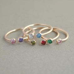 Our dual birthstone stacking ring in SOLID 14k gold!  This sweet gold ring makes a special keepsake for mom.  Double birthstones are perfectly paired any way you'd like in this dainty, modern gold ring.  Your two little gemstones may represent children, lovers, sisters or best friends or simply your favorite colors.  The options are endless and it's your choice with all twelve birthstones represented!  At a tiny 3mm it pairs beautifully with a second stackable dual birthstone ring, any of our ot Modern Gold Ring, Dual Birthstone Ring, Make Up Gold, Birthstone Stacking Rings, Couples Ring, Ring Turquoise, Mother Rings, Romantic Jewellery, Gold Filled Ring