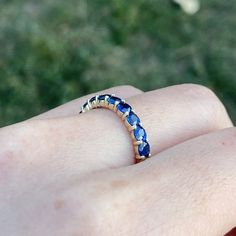 Timeless and beautiful! Handcrafted in 14K solid gold, this half eternity ring features well-matched natural blue sapphire. Made to Order Ship within 3-4 weeks. - Stone info: natural blue sapphire - Stone size: 3mm - Ct weight: 1.43ctw - Made in 14 karat gold. - Stamp with 14K 14k Gold Sapphire Half Eternity Ring, Blue Sapphire Eternity Band With Prong Setting, Blue Sapphire Half Eternity Ring In 14k Gold, Sapphire Eternity Band In Fine Jewelry Style, Eternity Ring Gold, Jewelry Appraisal, Half Eternity Ring, Gold Gift, Natural Blue Sapphire