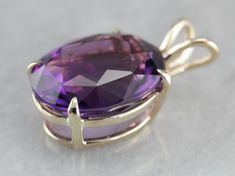 This amethyst gem is bursting with brilliant purple color! The oval cut faceting optimizes its luster, and the yellow gold only compliments the stone with its warm hue. This pendant could be worn everyday or for special occasions! This pendant does not come with the chain shown. Please feel free to contact us, we will help you find the perfect chain for your style and budget! Metal: 14K Yellow Gold Gem: Amethyst 14.00 Carats Gem Measurements: 17.7 x 14.5 mm, Oval Measurements: 26 x 15 mm, with b Jewelry Design Drawing, Snowflake Pendant, Cameo Ring, Amethyst Gem, Couture Jewelry, February Birthstone, Statement Pendant, Solitaire Pendant, February Birth Stone