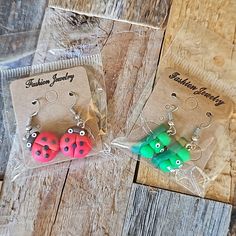 These Are So Cute! New And Unworn. Set Of 2 Red Ladybug And Green Sweet Pea Earrings For Pierced Ears. Made Of A Clay Or Resin. They Measure Approximately 1 1/2 Inches Long From Ear Wire To Bottom. Comes From A Smoke-Free And Dog Loving Home. 424-00 Cute Ladybug, Sweet Pea, Pierced Ears, Ear Wire, Cute Jewelry, Ear Piercings, Jewelry Set, Red Green, Jewelry Earrings