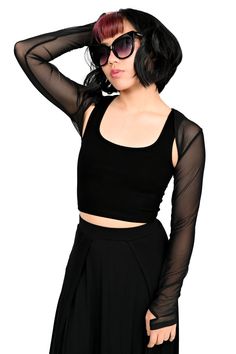 Our Signature Bolero, now in our soft 4 way stretch black mesh you know and love! A wardrobe staple. Perfect for a cool evening to throw over any of our classic cut dresses or tops. Wear it under a band t-shirt for extra layering. This is just for the bolero! It is a long sleeve shrug and does not include the dress. Models are wearing size XS and 2XL. Fits true to size. Part of the Foxblood Signature Collection. Designed by us in Los Angeles, California and made in our privately owned boutique f Black Shrug Outfit, Mesh Bolero, Duchess Dress, Deconstruction Fashion, Cut Dresses, Long Sleeve Shrug, Sleeve Shrug, Black Shrug, Boiler Room