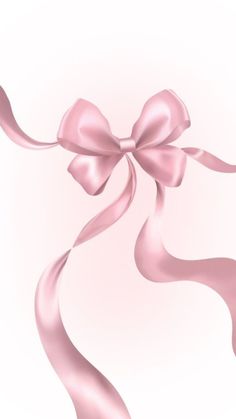 a pink ribbon with a bow on it's end is blowing in the wind