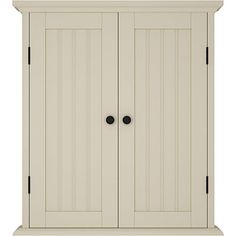 a white cabinet with two doors and black handles